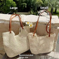 Beige woven cotton linen shoulder bag showing textured material and magnetic snap closure