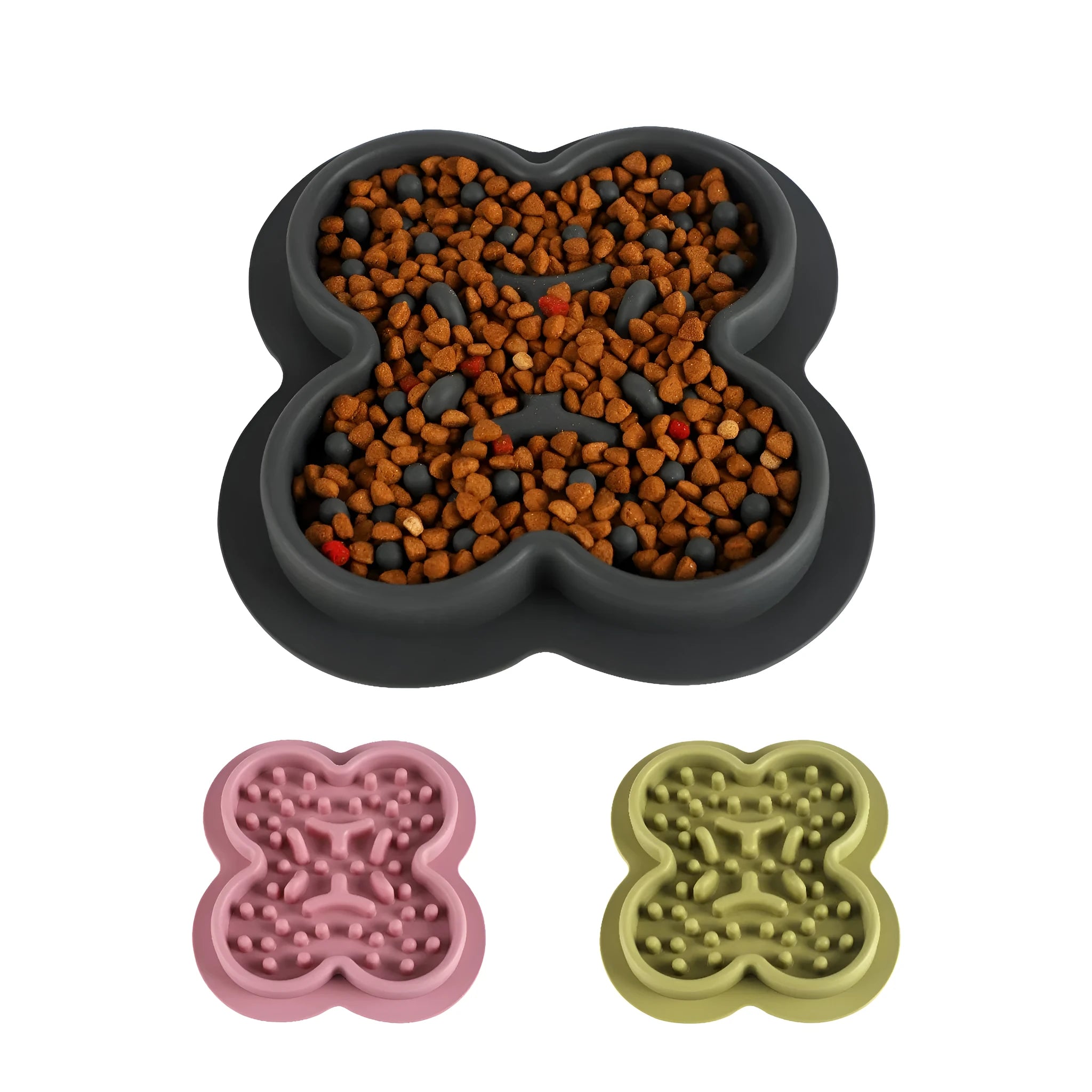 Silicone pet licking mat slow feeder in assorted colours on a floor