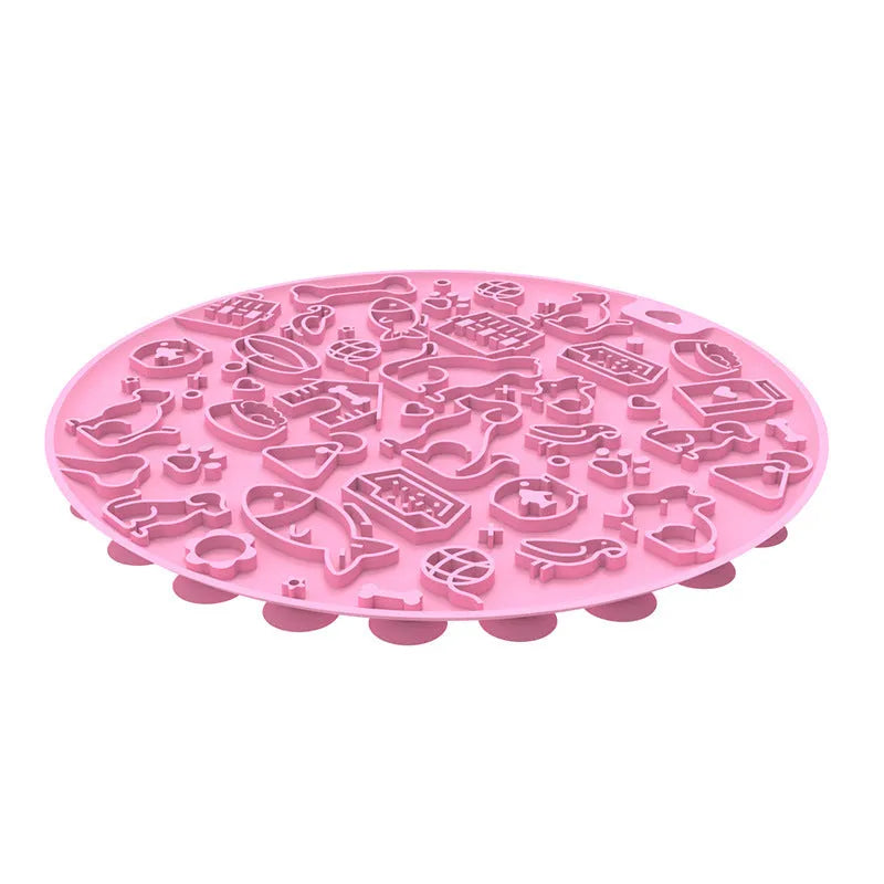 Round blue silicone pet licking mat with textured surface and a clear sucker base on the bottom.