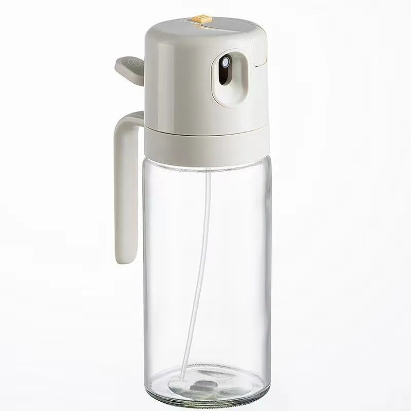 Warm grey glass oil sprayer and pourer bottle with switchable cap and detachable nozzle.