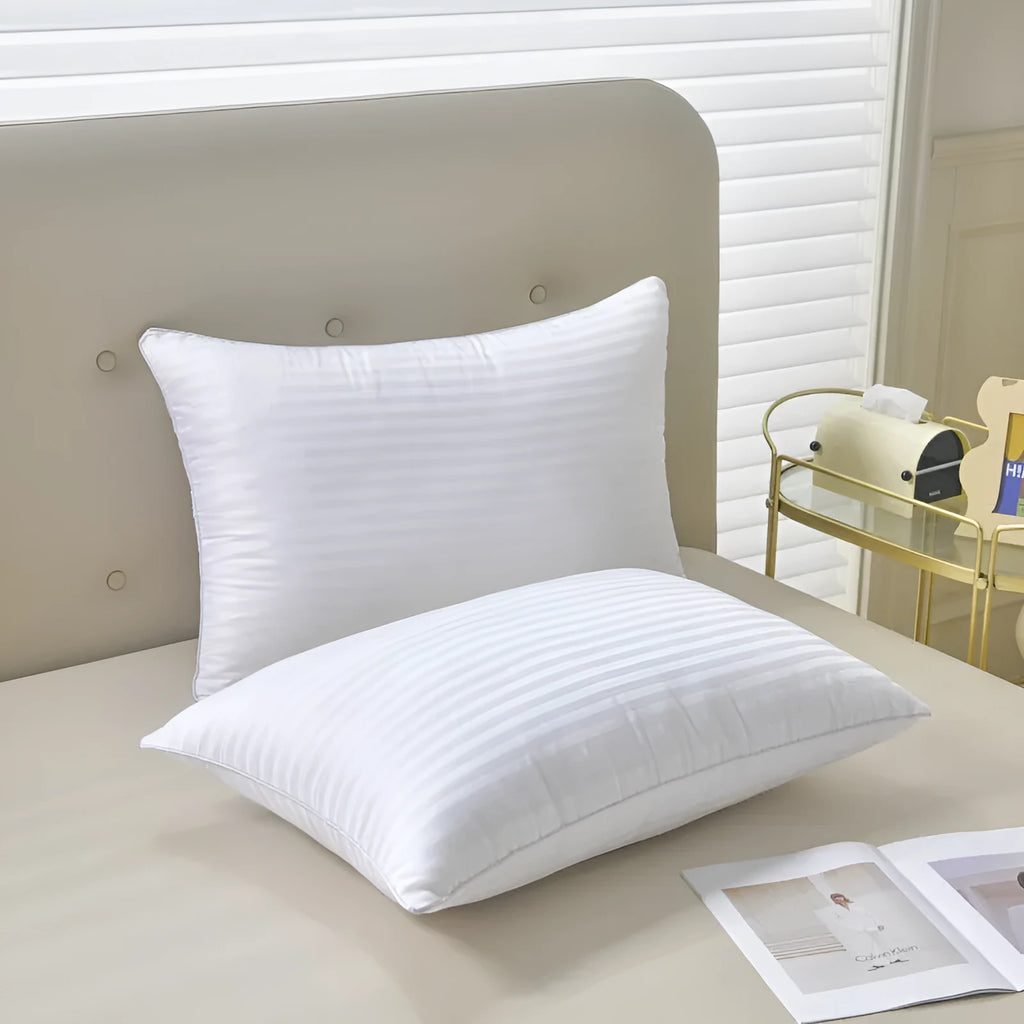 White hotel cotton satin stripe pillow with feather cotton filling shown in three size options.