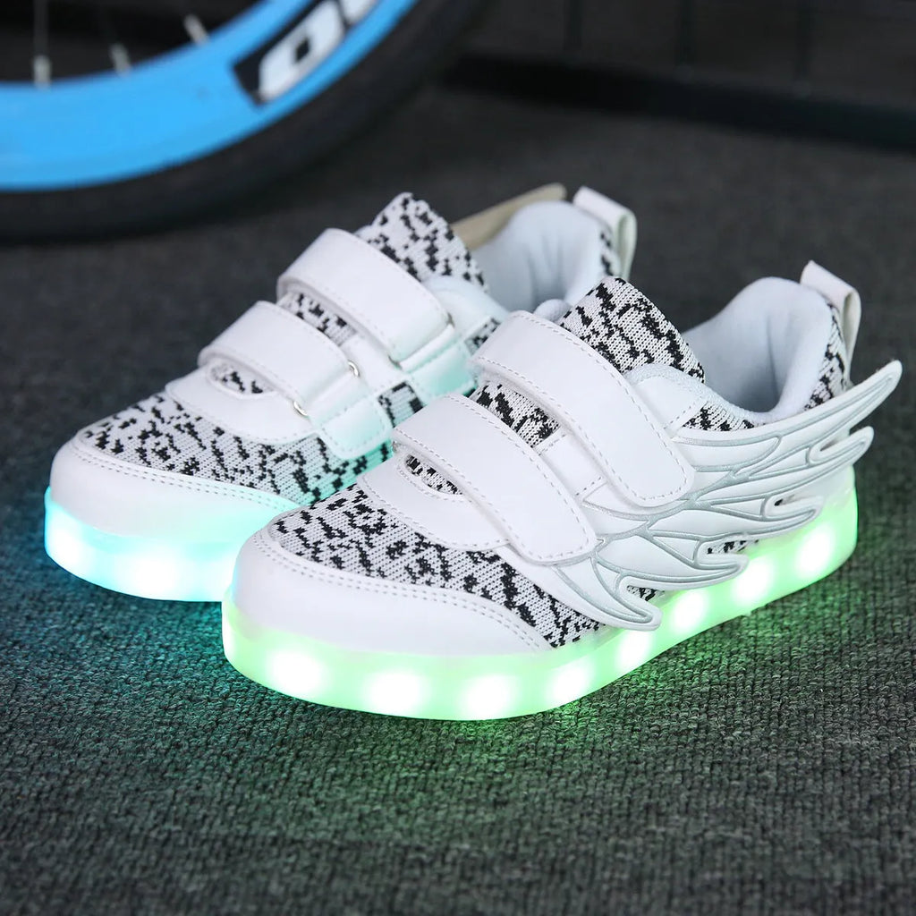 Children's plum red and white LED light-up sneakers with USB charging port.