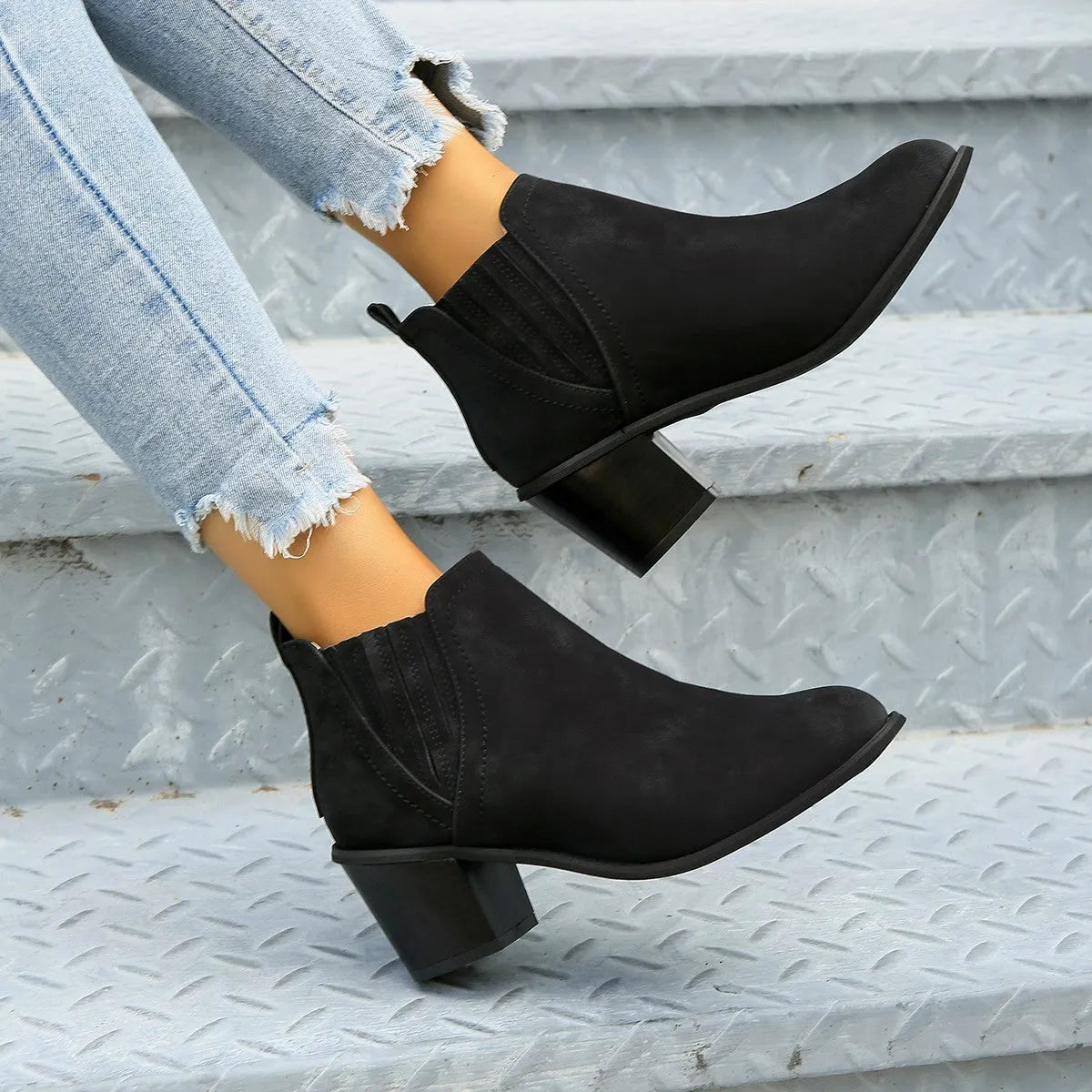 Women's black ankle boots with pointed toe and thick square low heel for autumn winter wear