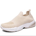 Slip-on breathable sock shoes in black, pink, khaki, and white colours on a white background.