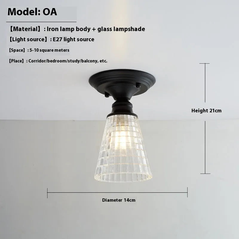 American retro single-head ceiling lamp with clear glass shade showing exposed filament style