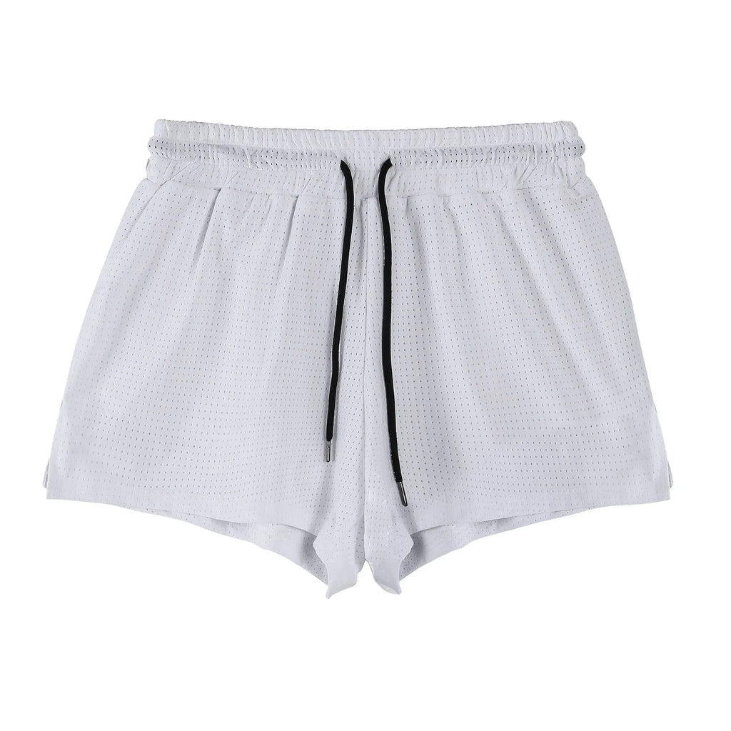 Men's black and white quick-drying nylon shorts for summer sports and leisure.