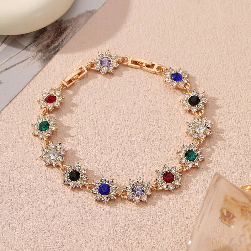 Flower-shaped zinc alloy bracelet with electroplated finish and decorative stone details