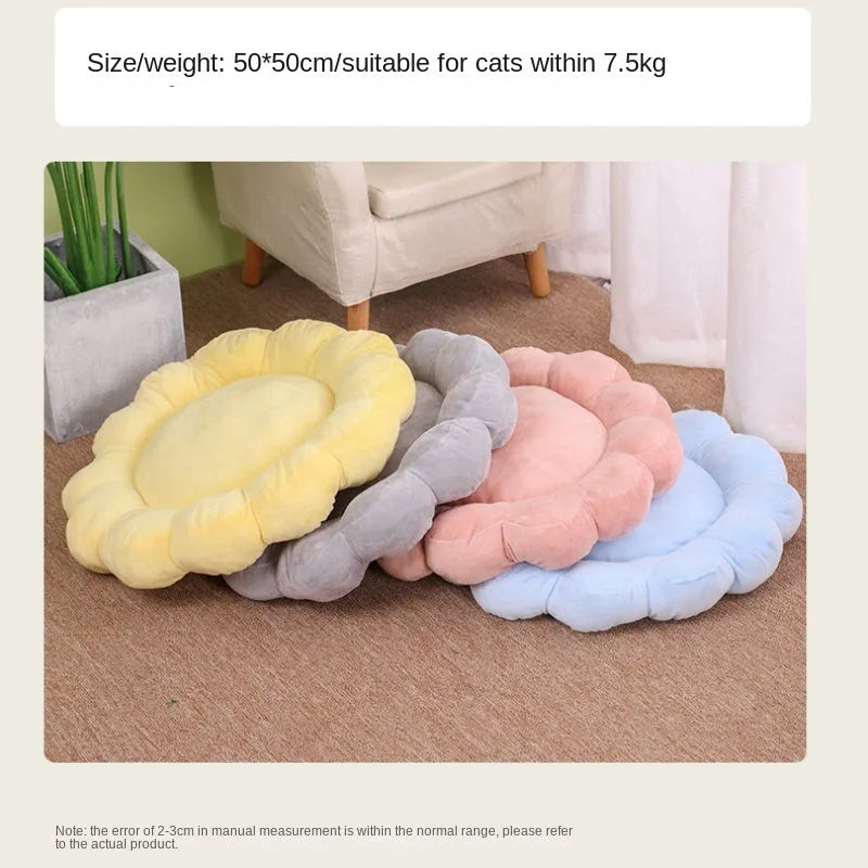 Square blue pet bed cushion with a half-surrounded side and short plush fabric