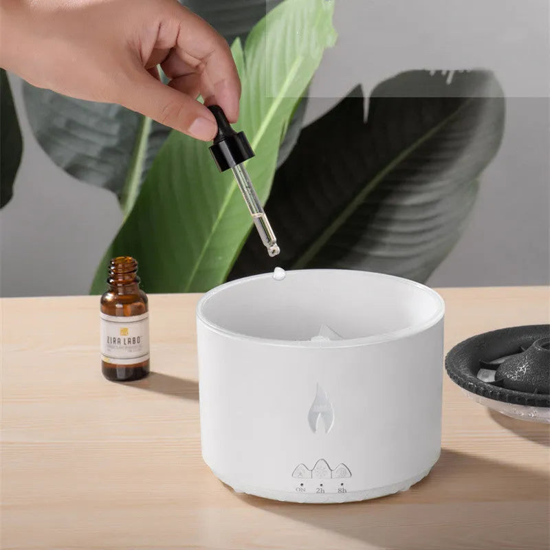 Round two-colour spray ring volcano humidifier with LED lights on a surface