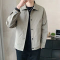 Man wearing a thin, grey, Korean-style long sleeve casual jacket for spring or autumn.