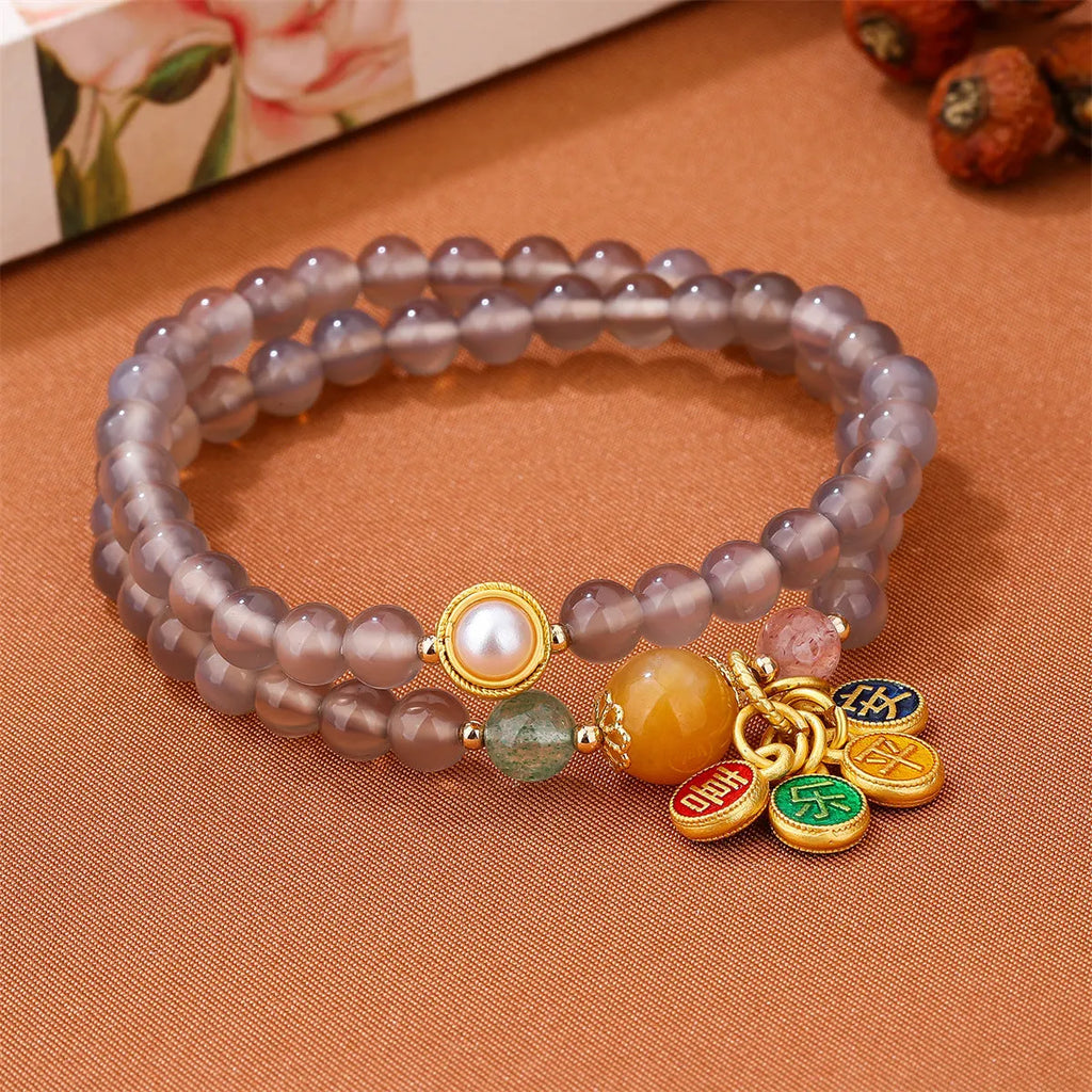 Natural grey agate women's bracelet with two-circle design showing safe and happy symbolism