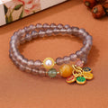 Natural grey agate women's bracelet with two-circle design showing safe and happy symbolism
