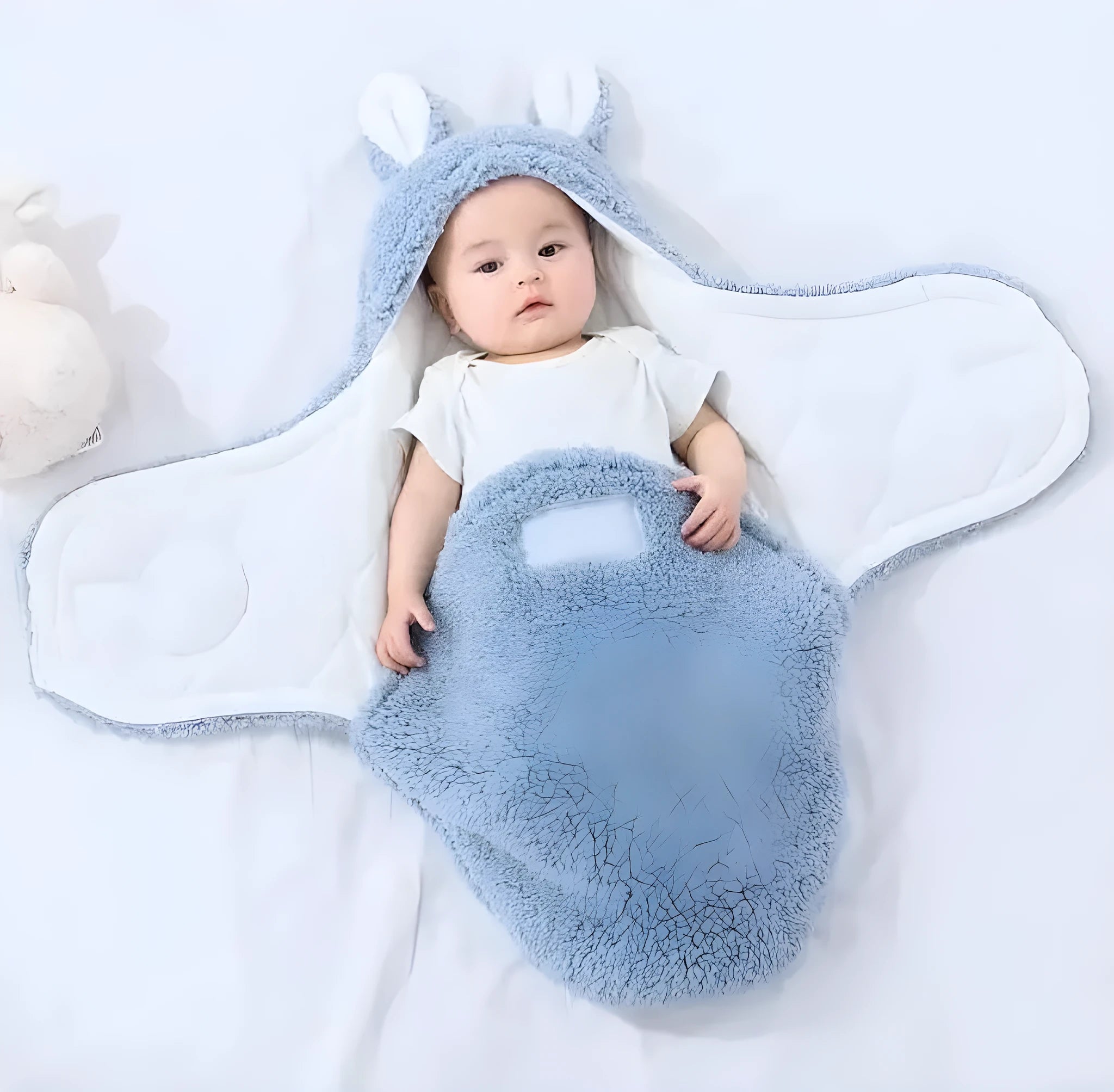 Fluffy fleece baby sleeping bag swaddle in blue with adjustable hook-and-loop closure for newborn