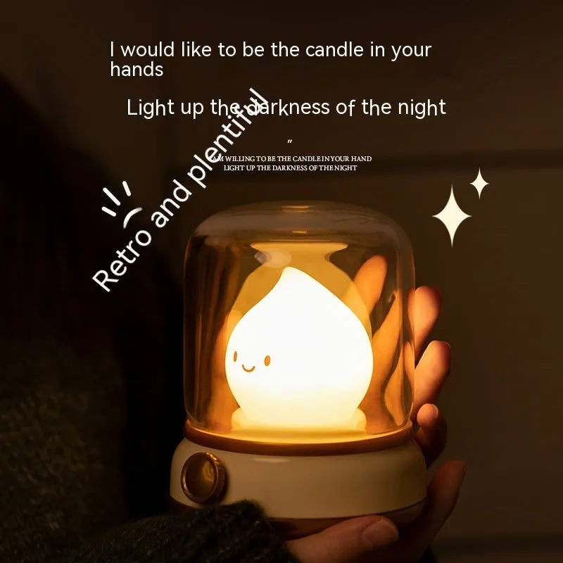 Green retro-style USB rechargeable LED night lamp with dimmer knob on wooden table
