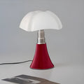 Italian retro style flower table lamp on a bedside table in a choice of colours.
