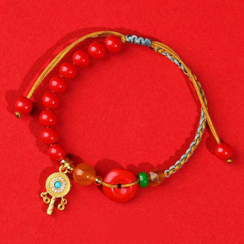Emperor red sand cinnabar bracelet with hand-woven geometric patterns and peace buckle closure