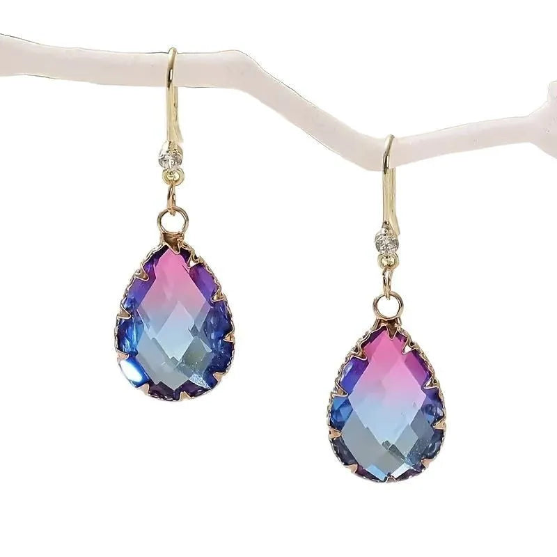 Coloured glass crystal heart earrings for women showing four colour variations