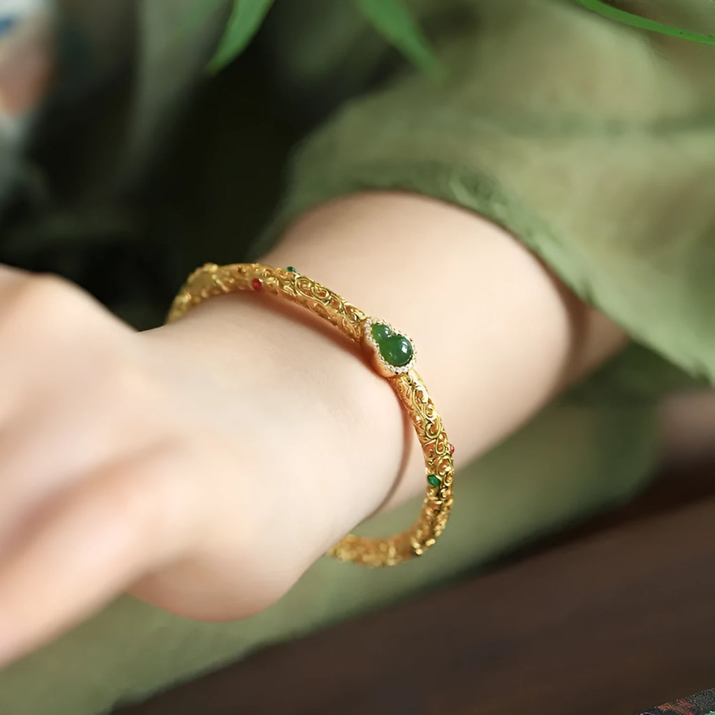 Gold-plated women's bracelet with xiangyun gourd design and retro opening style