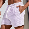 Men's loose fit American football shorts in polyester mesh fabric with elastic waistband