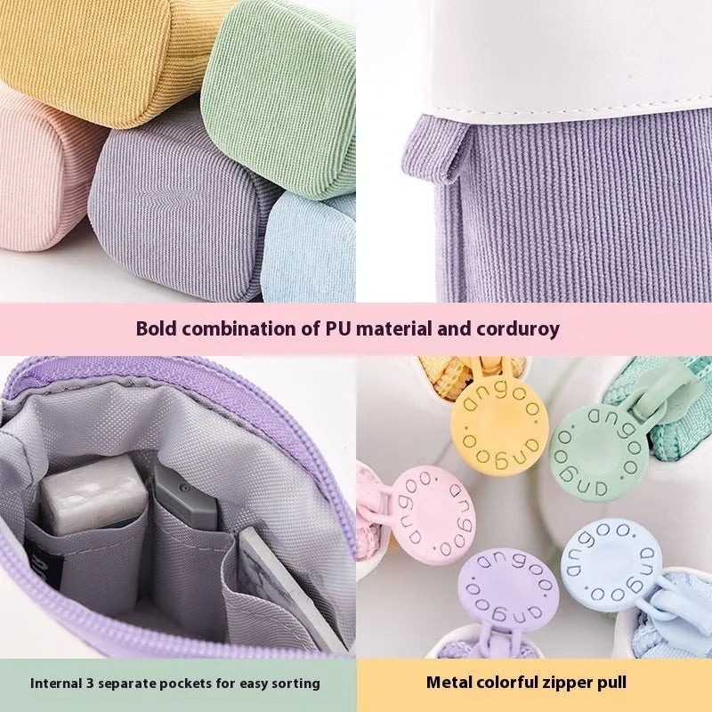 Purple PU corduroy drop-down telescopic stationery case on a desk