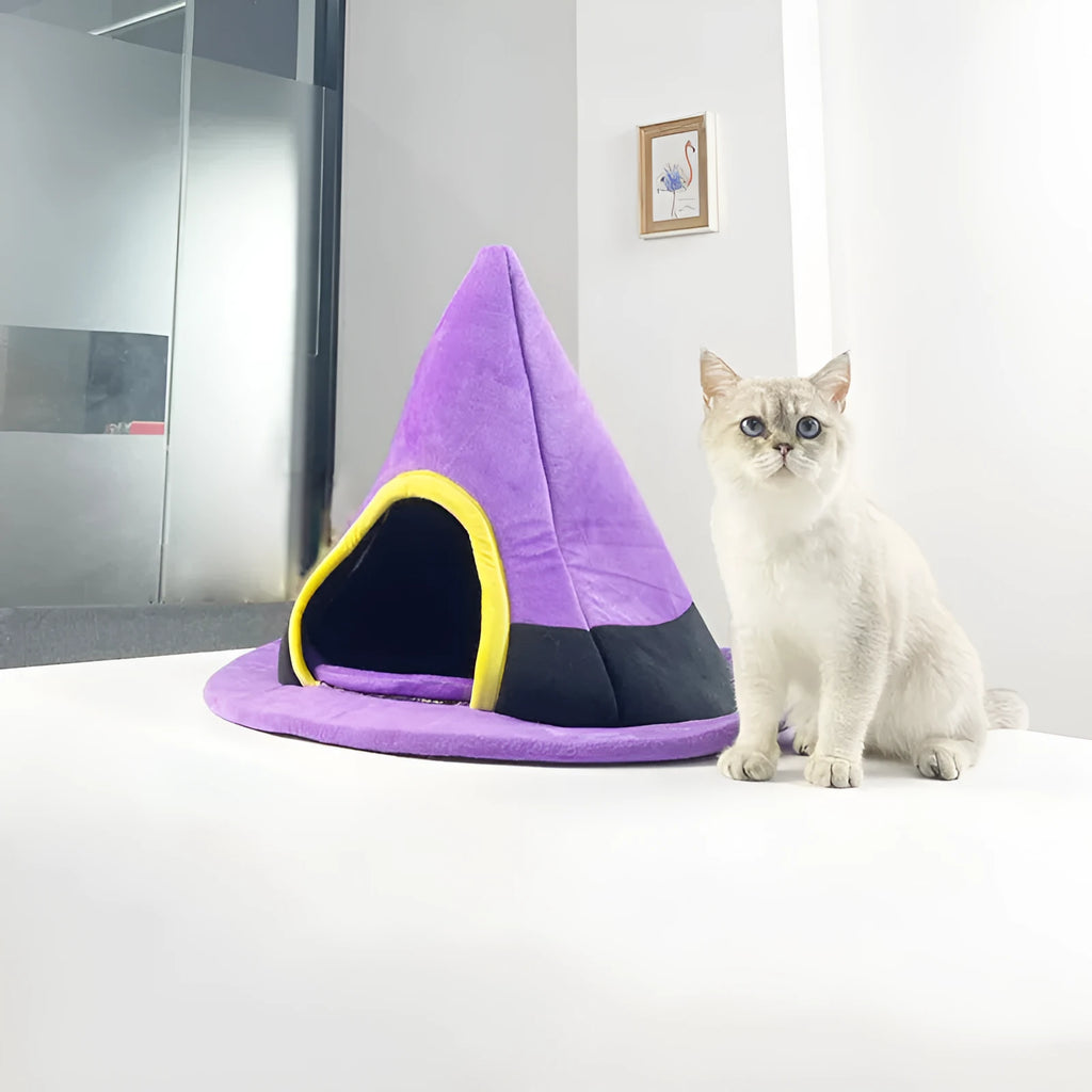 Purple witch hat shaped cloth cat nest bed for feline pets.