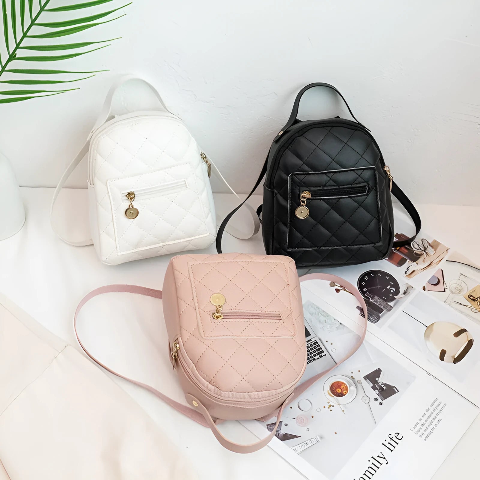 Girls' embroidered Korean style small hard backpack in black, shown with sandwich pocket.