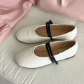 Mary Jane shoes with round toe and buckle, low heel under 3cm, sheepskin upper, white or black, sizes 35-40.