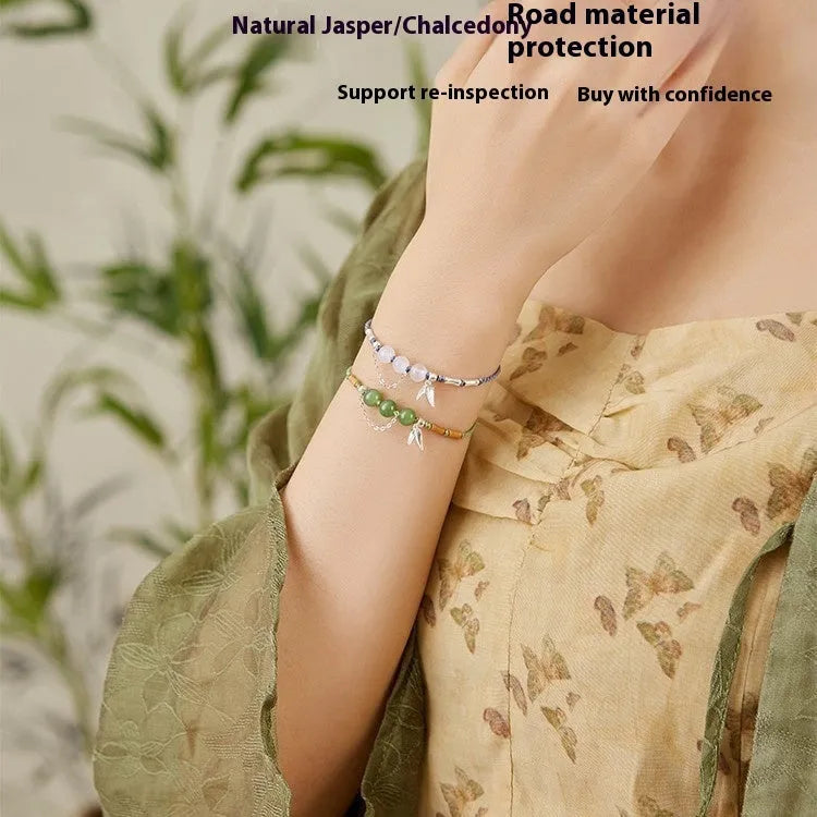 Women's Hetian jade bracelet with woven strap in diamond shape featuring lotus seedpod design