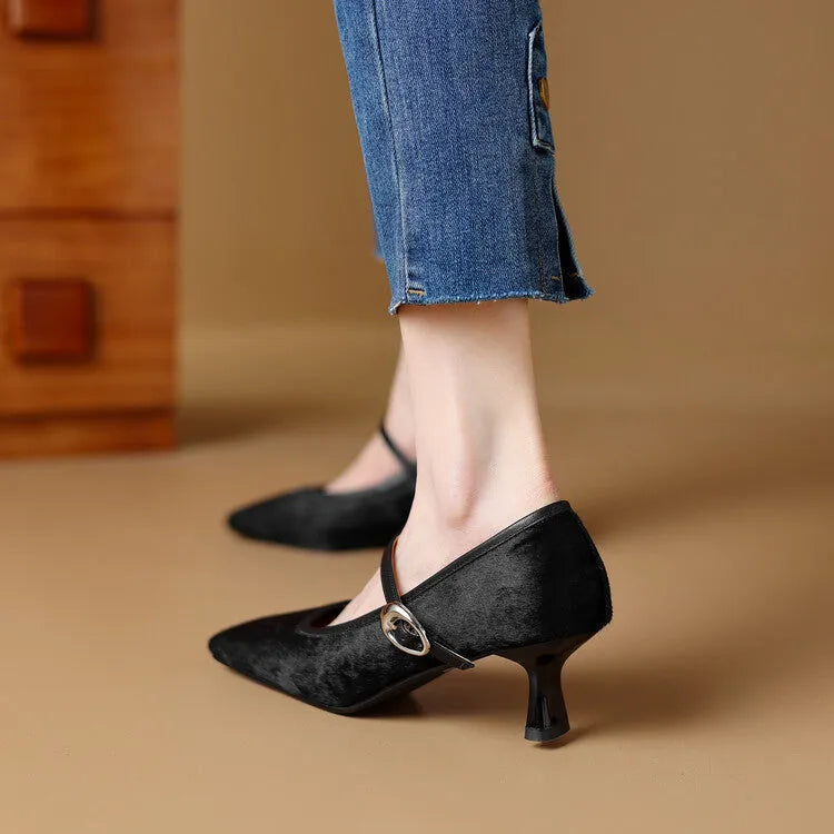 Women's black square toe stiletto heel ankle-strap shoes with horse hair upper on a plain background