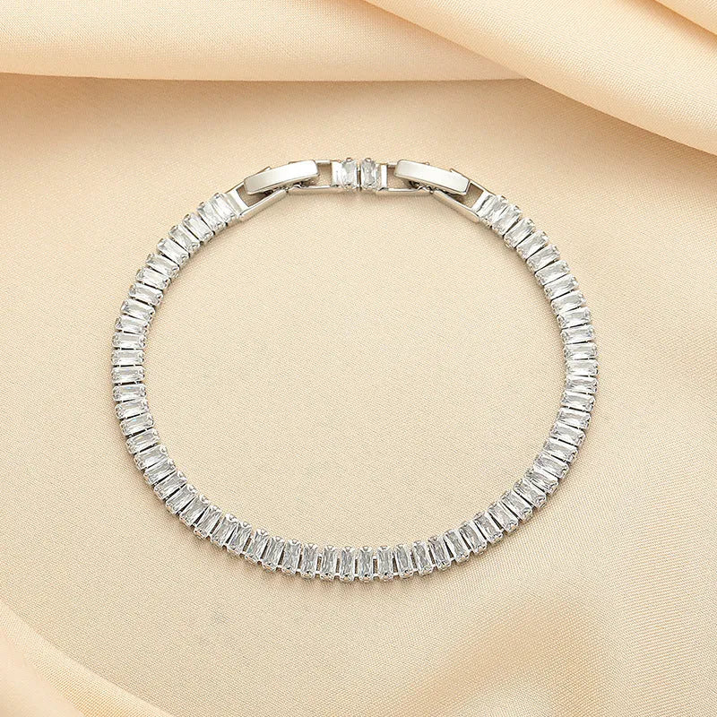 Rectangular brass women's bracelet with diamond zircon treatment in champagne gold colour