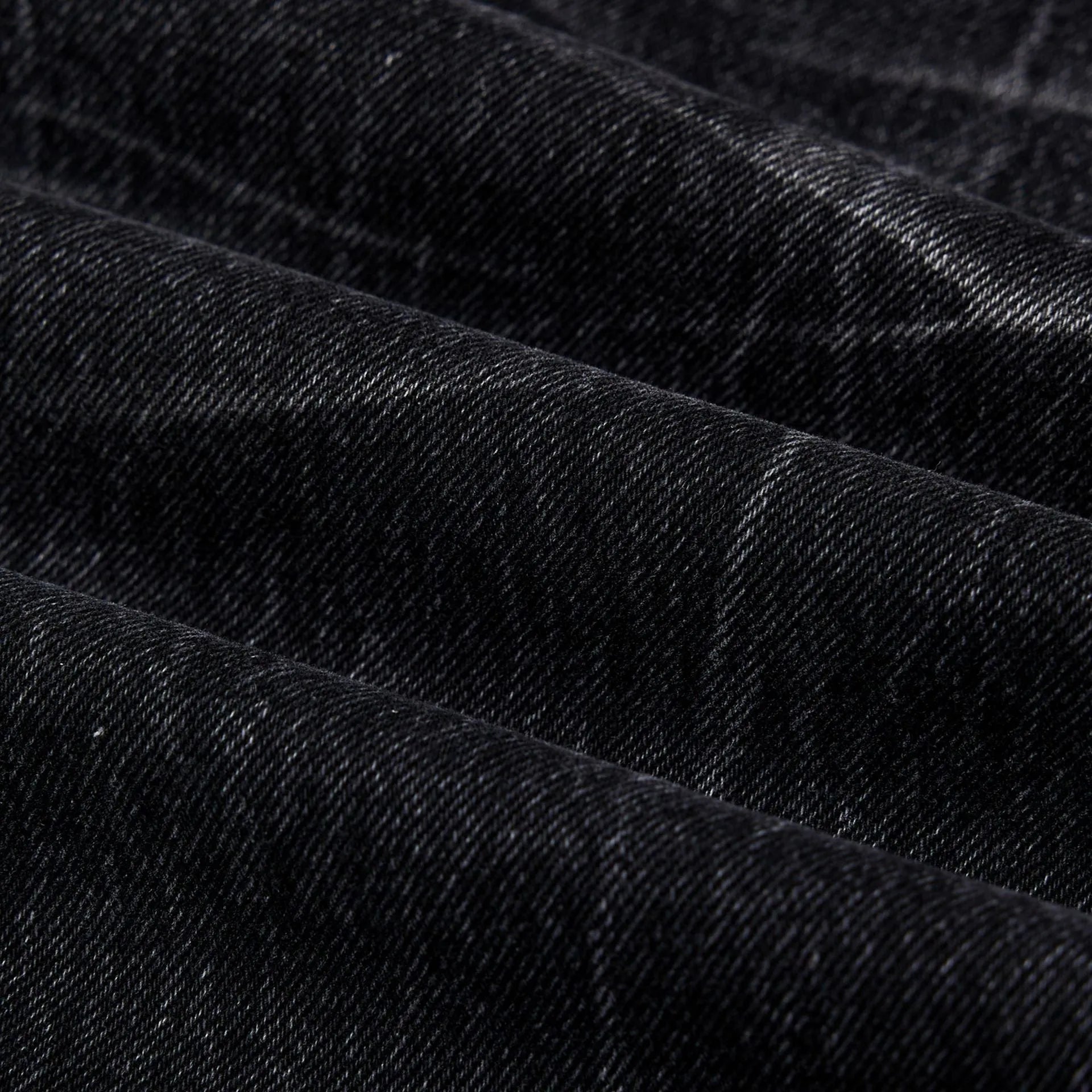 Black men's straight-leg jeans with American washed lightning crack texture