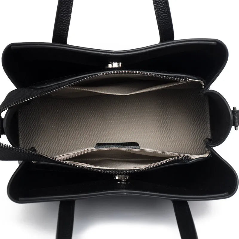 Women's cowhide leather shoulder handbag in horizontal square design with internal compartments