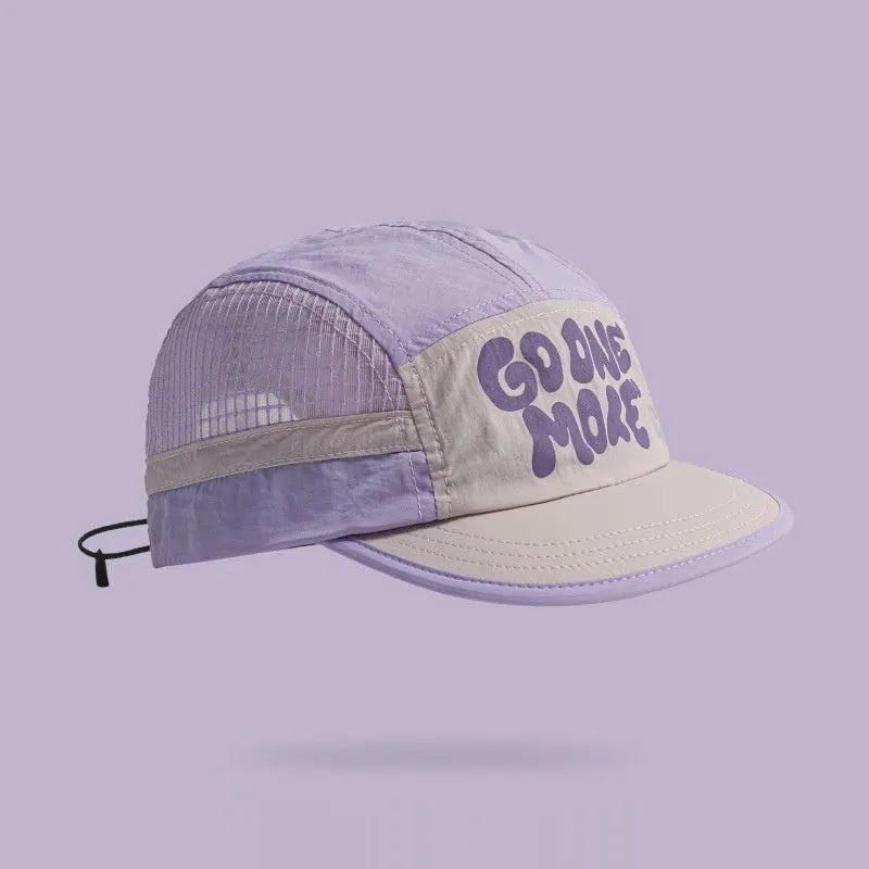 Gradient coloured quick-drying mesh baseball cap with dome crown and printed detail.