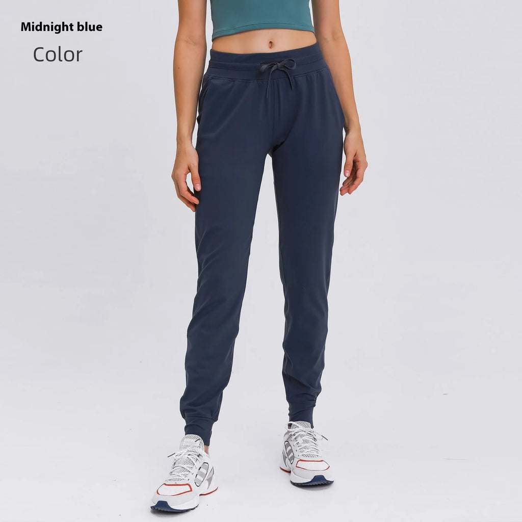 Women's high waist yoga pants with drawstring in quick-drying fabric, multiple colour options