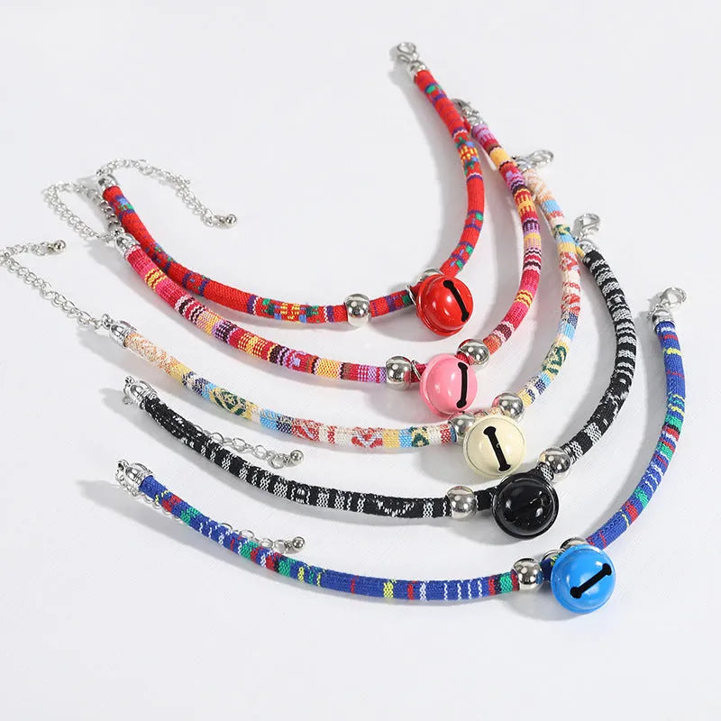 Coloured ethnic floral pattern pet collar with a bell and plastic buckle for dogs and cats.
