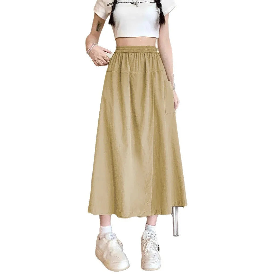 Camel-coloured women's wide leg skirt with elastic waistband, shown on hanger