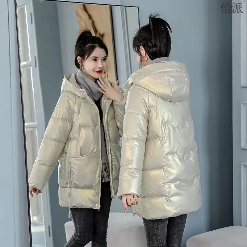 A women's loose-fit hooded winter jacket in a polyester blend, available in black, blue, green, and champagne.