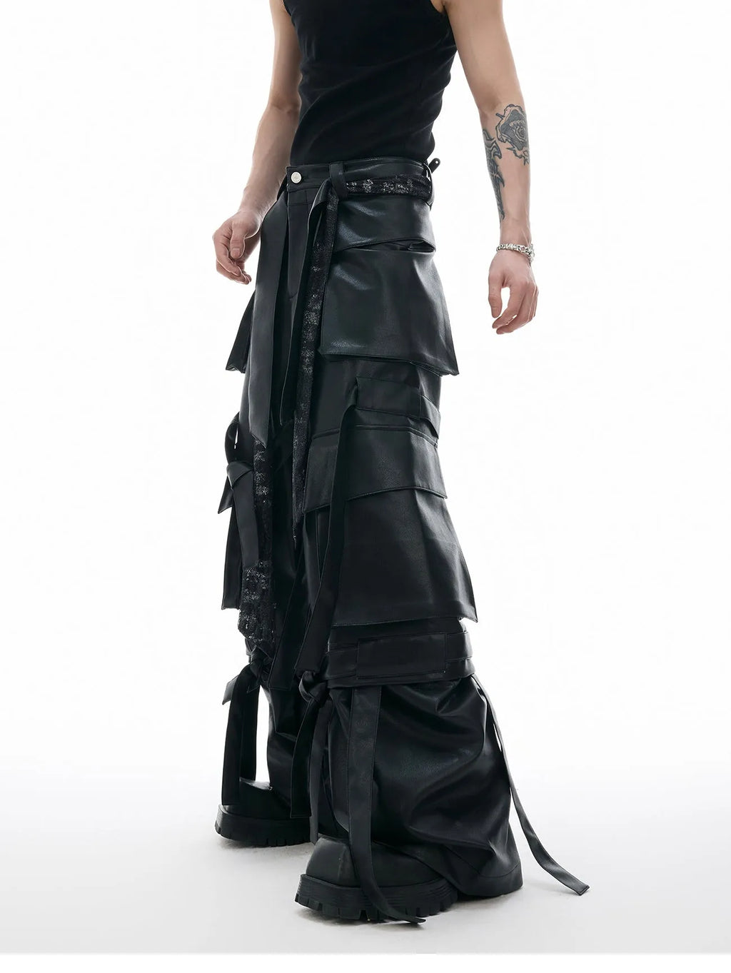 Black loose-fit trousers with quilted stitching pattern and multiple pockets