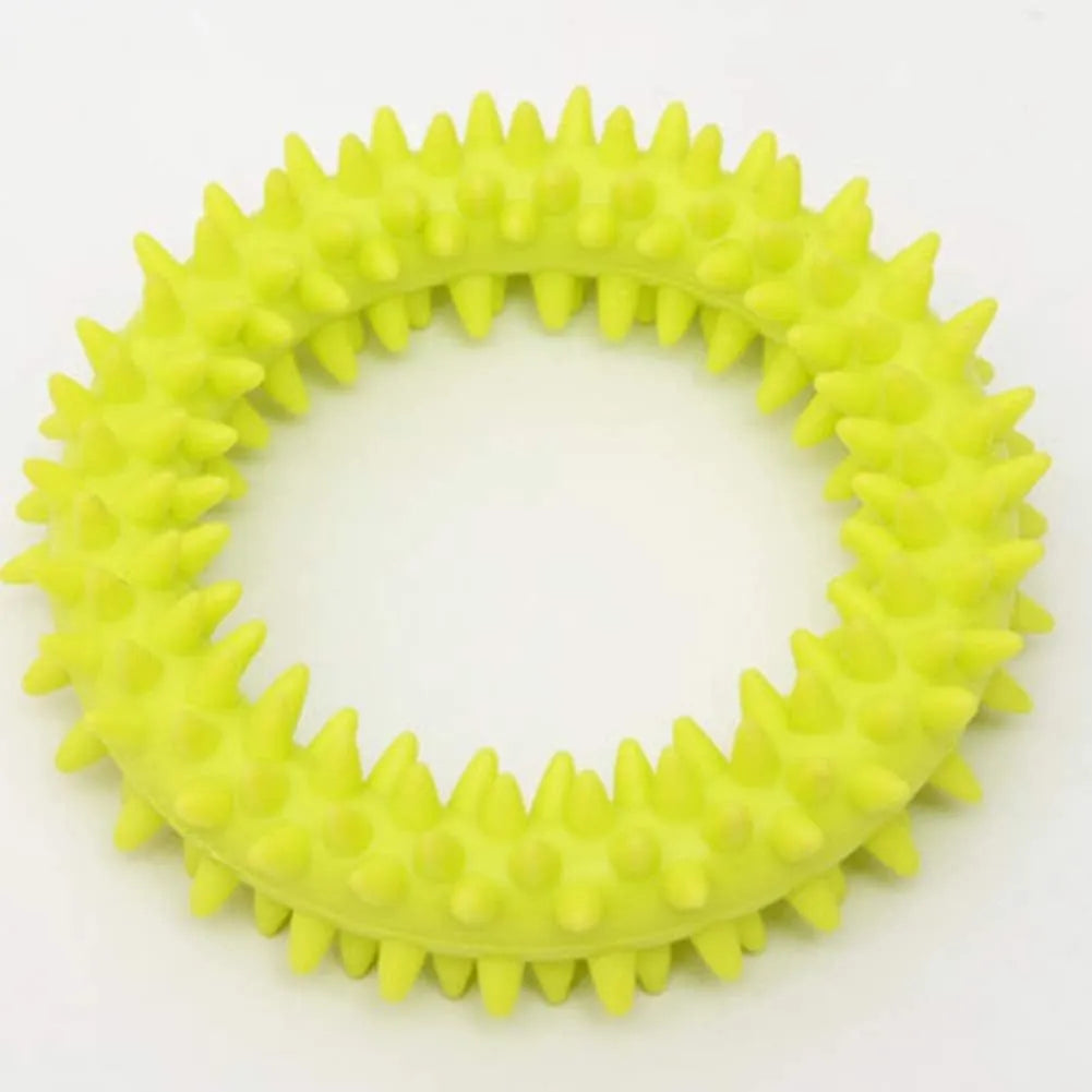 Blue TPR spiky circle ring dog chew toy on a white background.