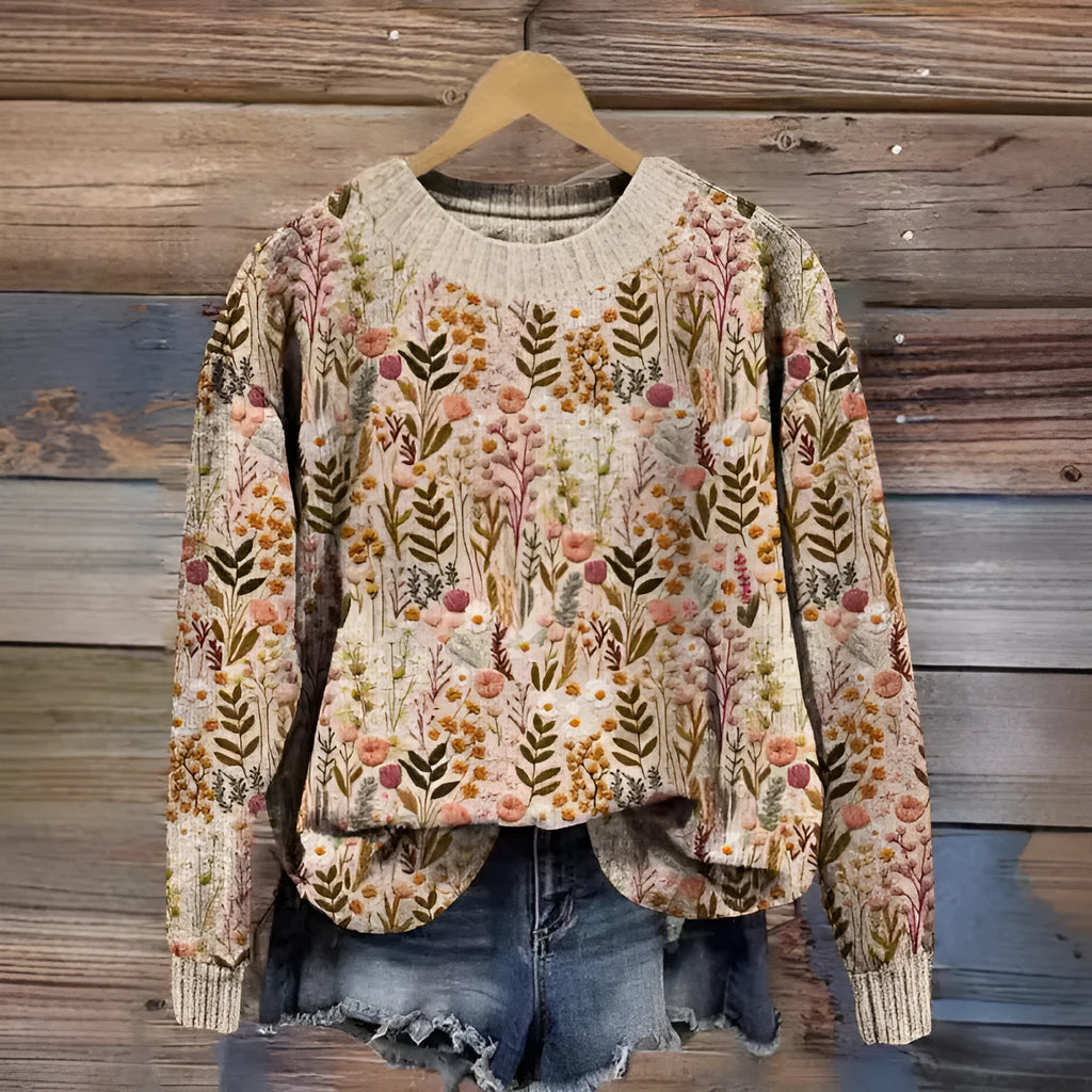 Digital printed floral pattern on a round neck polyester sweater, shown in one of multiple available colours.