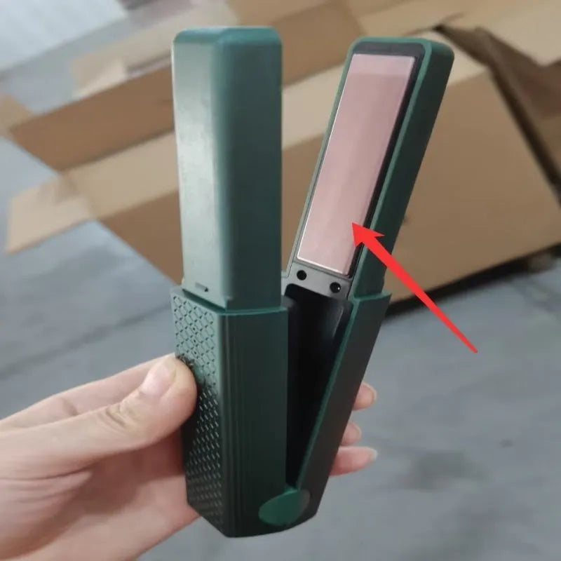 Pink and green cordless USB hair straightener and curling iron with ceramic plates.