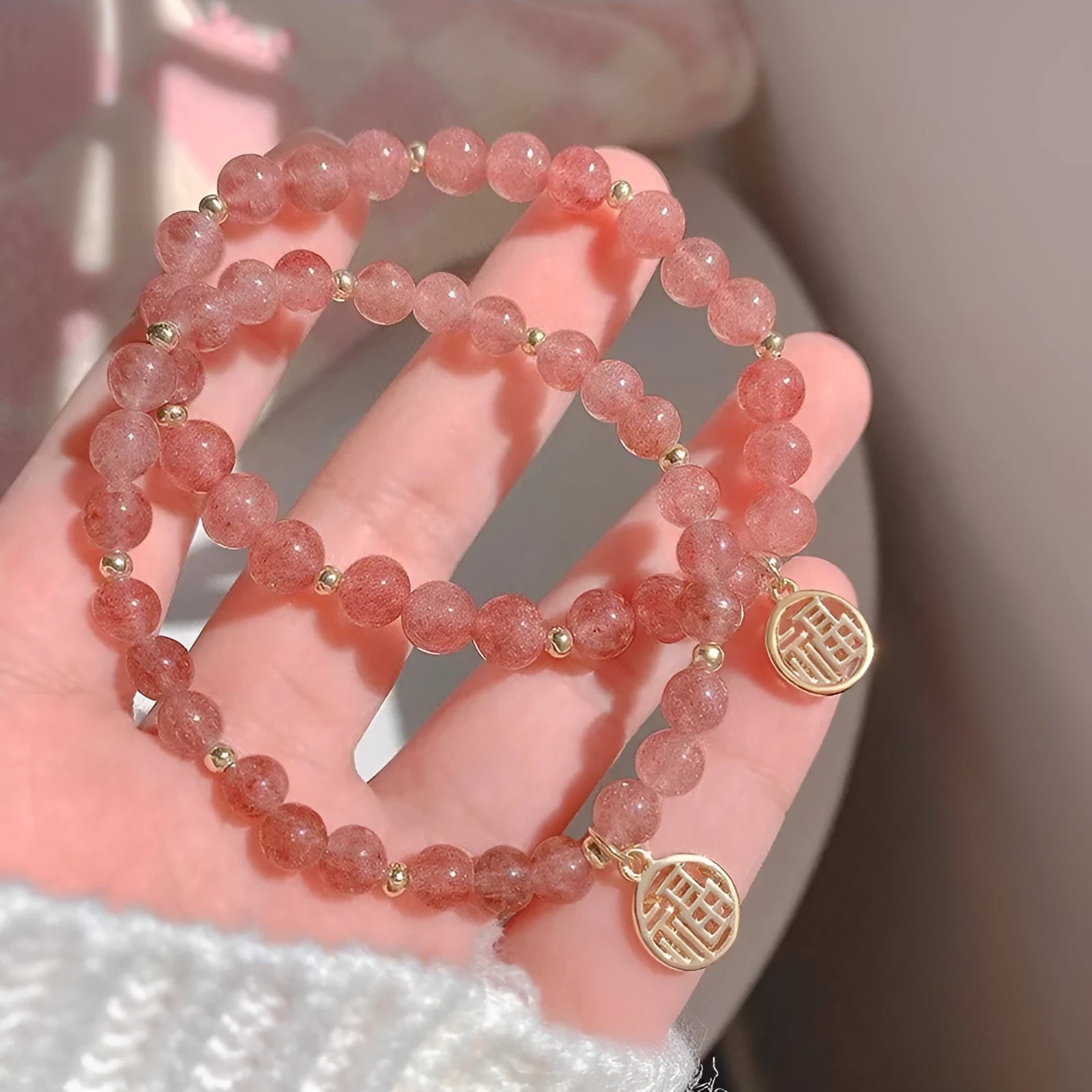 Strawberry quartz glass blessing card bracelet with adjustable clasp on wrist