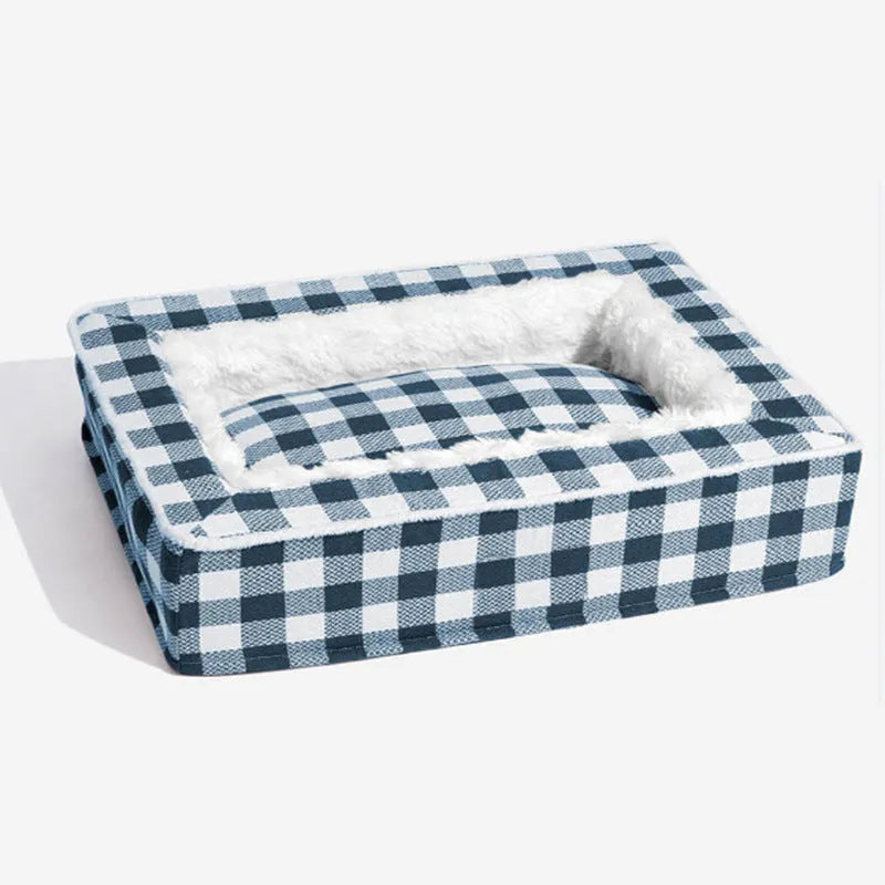 Classic plaid removable dog kennel bed in red tartan pattern showing soft cloth construction