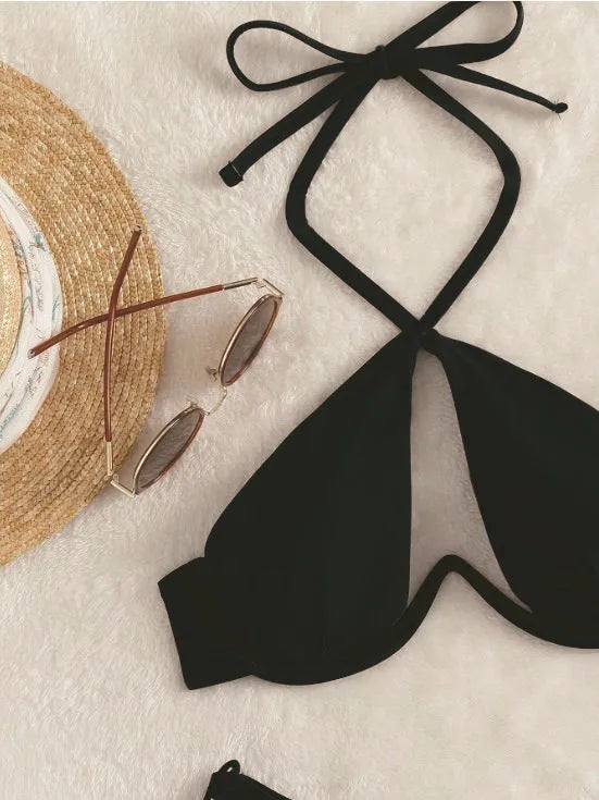 Brown women's halter neck bikini top and briefs-style bottom laid flat.