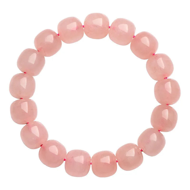 Pink crystal barrel bead bracelet with 8-10mm polished geometric beads