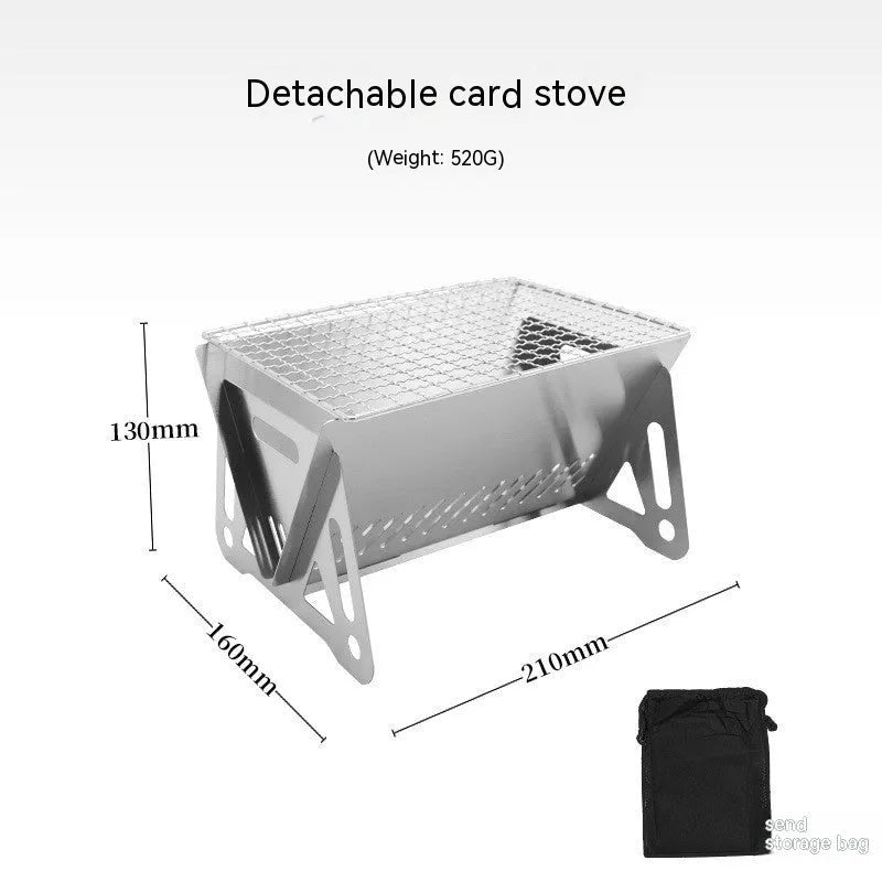 Large foldable stainless steel barbecue oven with storage bag, set up for outdoor use.