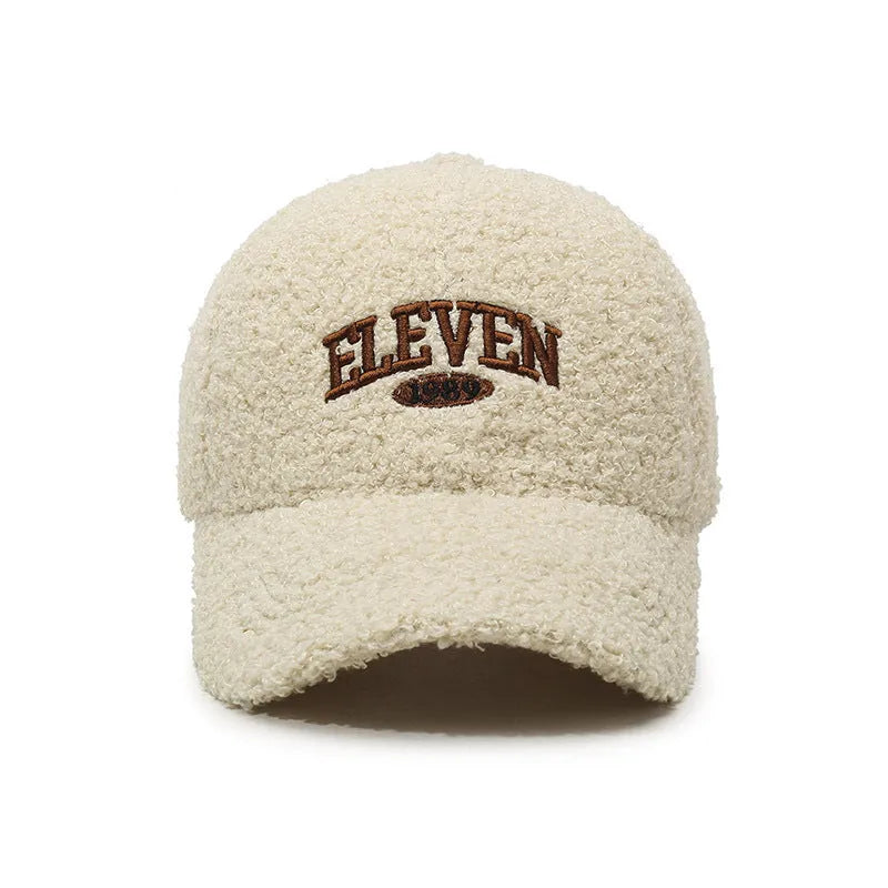 Adjustable winter baseball cap in lambskin polyester fabric showing dome crown design