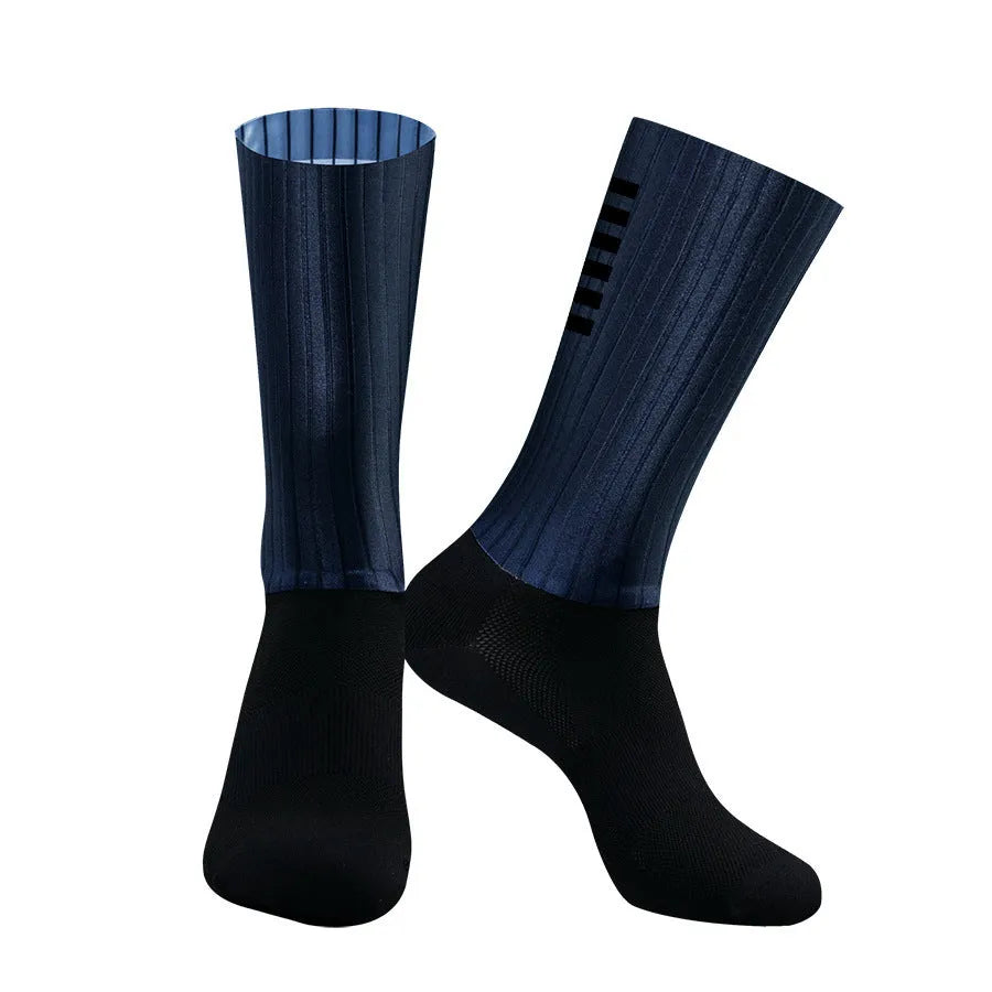 Pair of athletic socks for cycling and running in a chemical fibre blend, shown in one of six available colours.