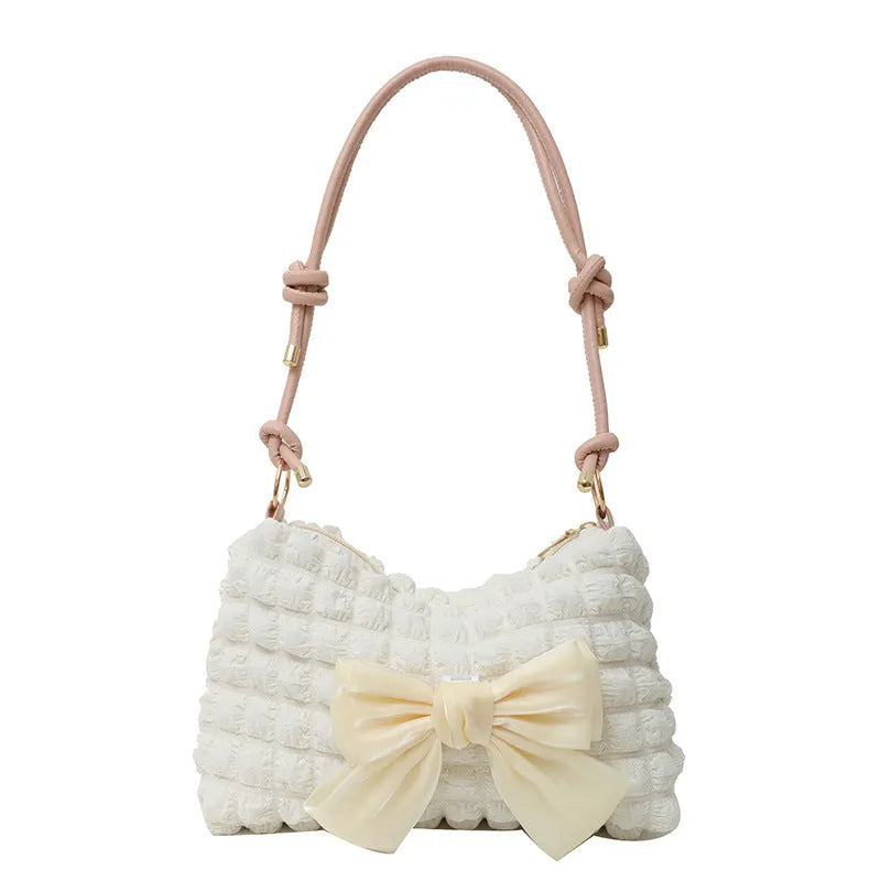 Women's canvas one-shoulder handbag in horizontal square shape with single strap and internal mobile phone pocket