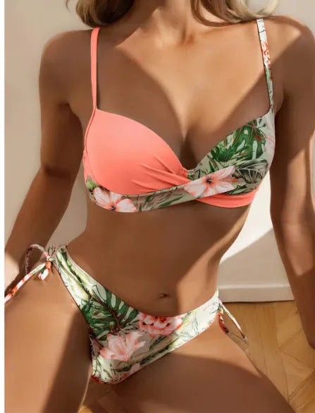 Women's green printed bikini set with push-up top and drawstring side briefs on a mannequin.